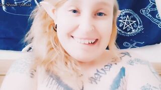 Elf smokes with her tits out