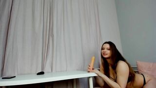 Dildo suck sitting on a table