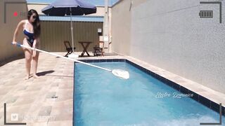 Very hot brunette cleaning the pool