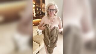 Annabel’s fur cape and white nylons