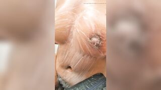 Ebony milf masturbates and reaches for a squirt and then showers outdoors