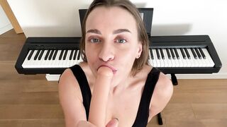 Brunette with big boobs sucking big dildo closeup