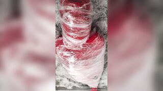 NANA Mummified with red plastic tape and then played with for orgasms
