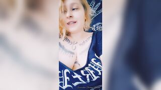 Metal girl smokes a cigarette