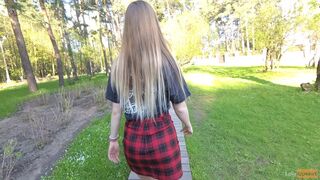 Naughty girl in miniskirt no panties flashing in the park (public upskirt)