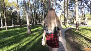Naughty girl in miniskirt no panties flashing in the park (public upskirt)
